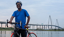 Biker in front of the Arthur Ravenel Jr. Bridge